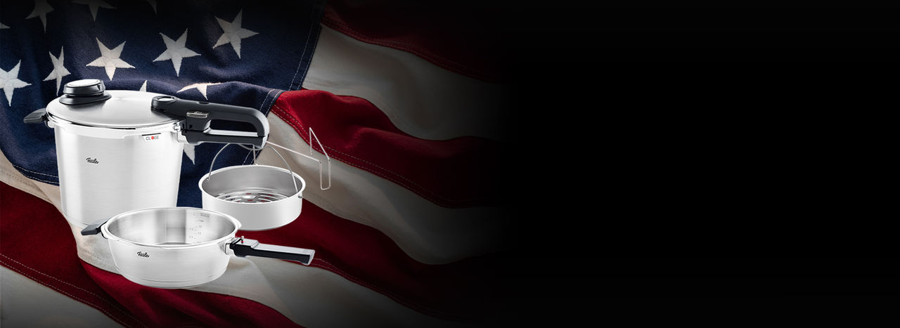Close-up US Flag American flag waving in sunlight, red white stripes blue field stars.